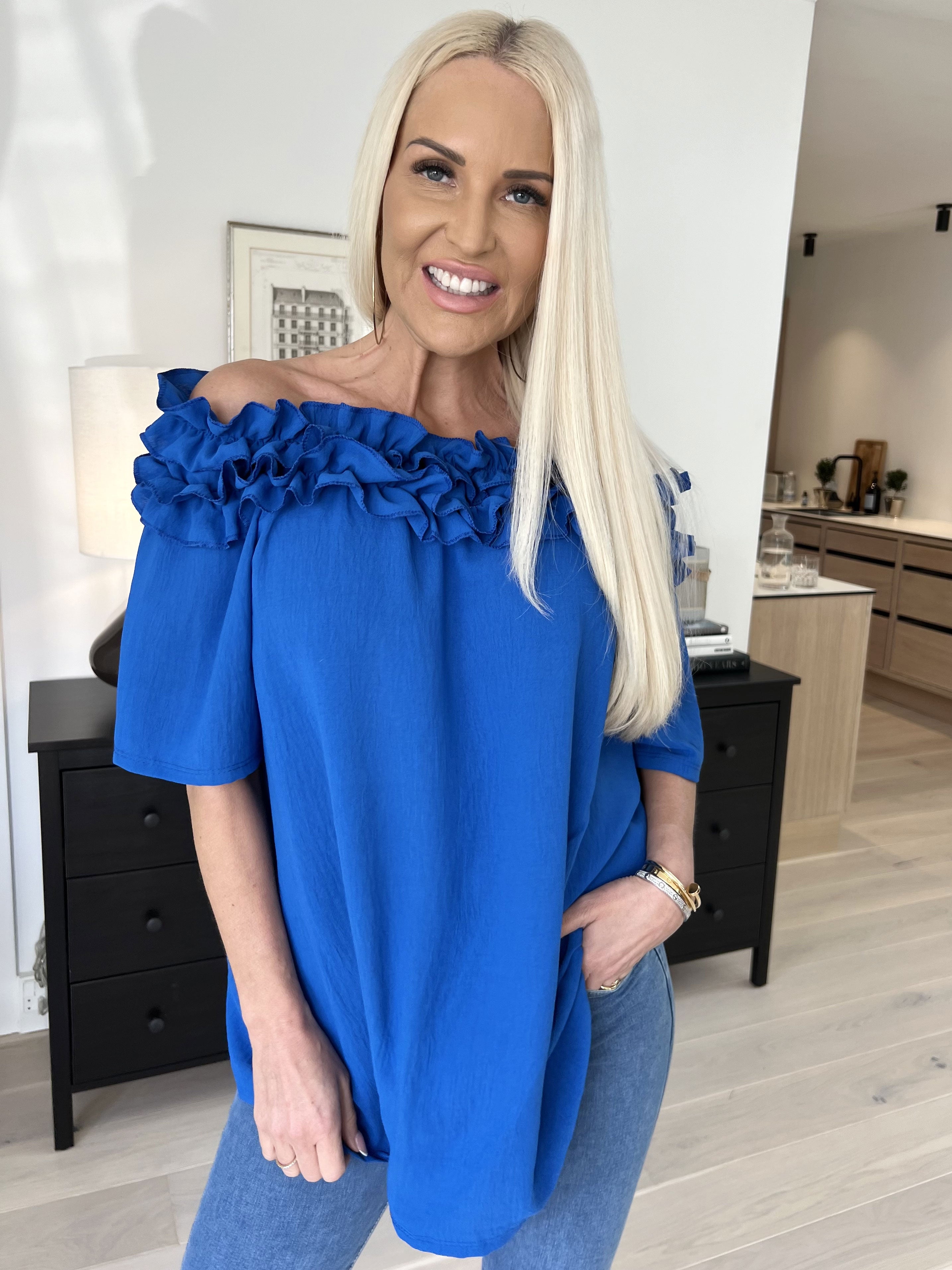 Chili Sleeveless - Finaste tunika med resår och volang i halsen